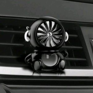 Car fragrance diffuser with air vent mounted rotating fan